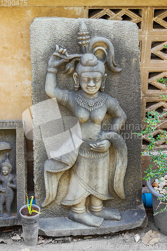 Image of Small statue of the mythological character of concrete. Bangkok