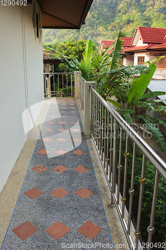 Image of Balcony of a house overlooking the village and the jungle