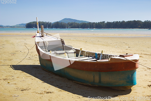 Image of Boat on land in the area of sea tide