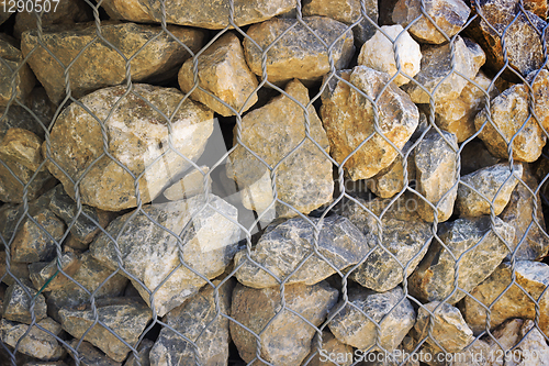 Image of Grid with gray granite stones, background