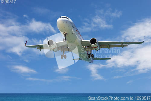 Image of Airbus A320,  landing in Phuket International Airport  in Thailand