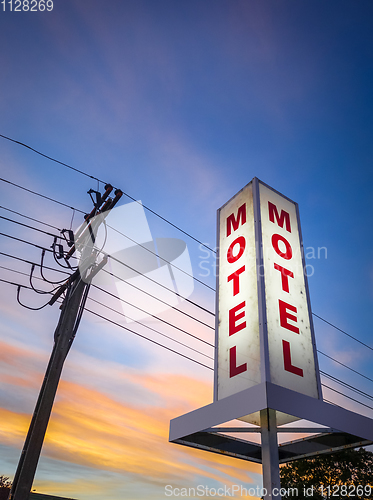 Image of Vintage motel sign at sunset 