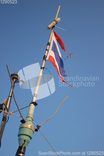 Image of Storms battered the Thai flag on the mast