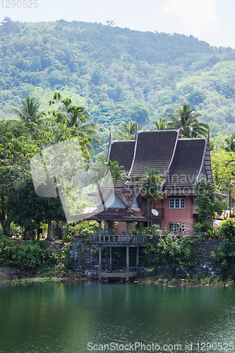 Image of Lake House at the foot of the mountains