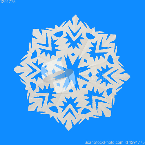 Image of White snowflake cut out of paper