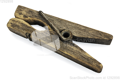 Image of Decrepit wooden clothespin on white background 