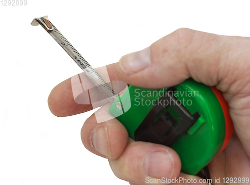 Image of Tape measure in hand wizard on white