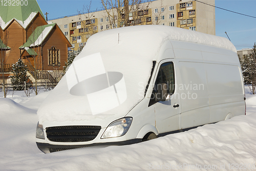 Image of Car in the snow on the street the northern city in Russia