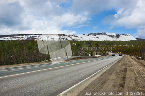 Image of Road in nort region Russia. Early spring