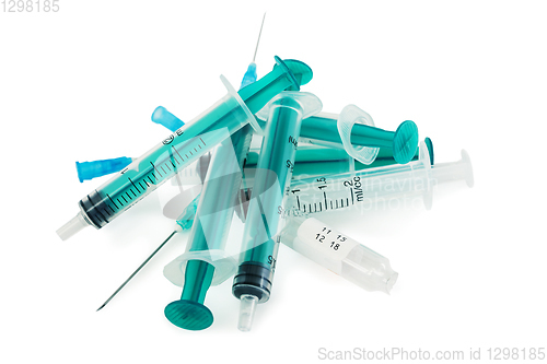 Image of Used syringes and ampoules on a white background 