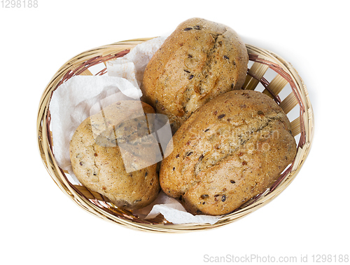 Image of Oatmeal bun in a small basket, white background