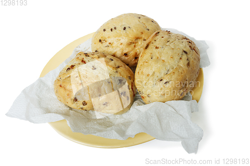 Image of Three Bun wheat on a paper napkin on white