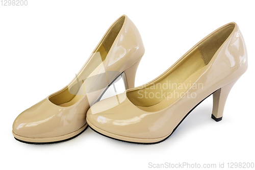 Image of Elegant shoes of beige color white background