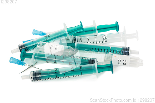 Image of Used syringes on white background