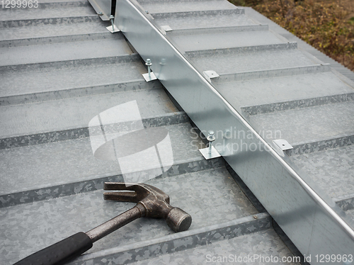 Image of The barrier for snow guard on the edge of roof
