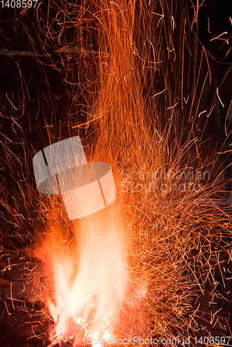 Image of Traditional blacksmith furnace with burning fire