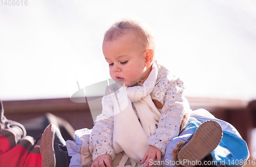 Image of portrait of little baby boy on beautiful winter day