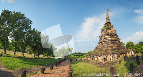 Image of Ruins stupa with sculpted images of elephants. Panorama.Thailand