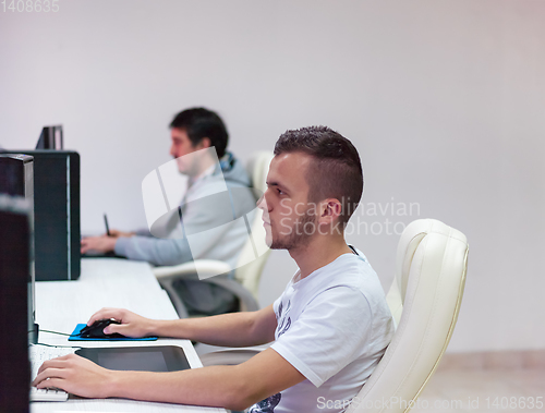 Image of Graphic Designer Working at Workplace