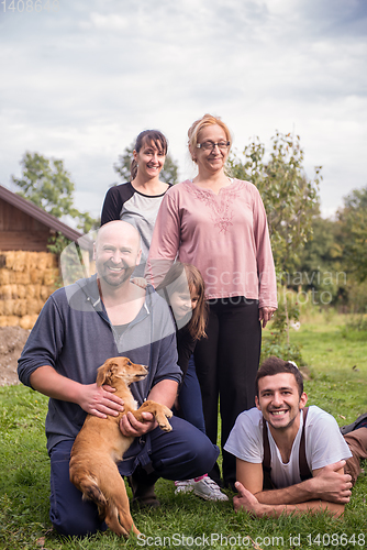 Image of portrait of happy family at farm