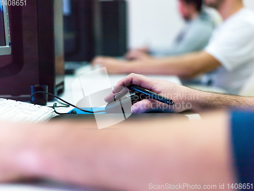 Image of Closeup of Graphic Designer Working at Workplace