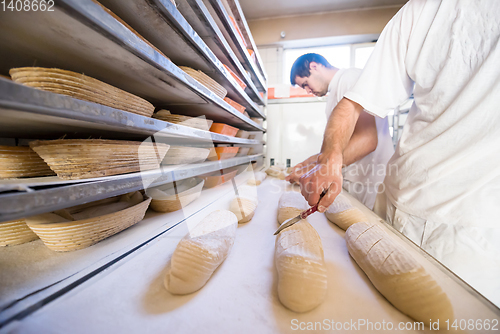 Image of bakers preparing the dough