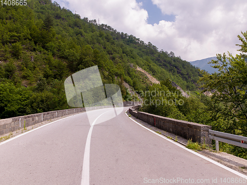 Image of asphalt road in beautiful countryside