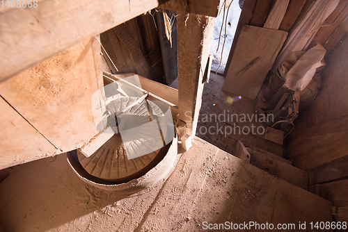 Image of interior of retro wooden watermill