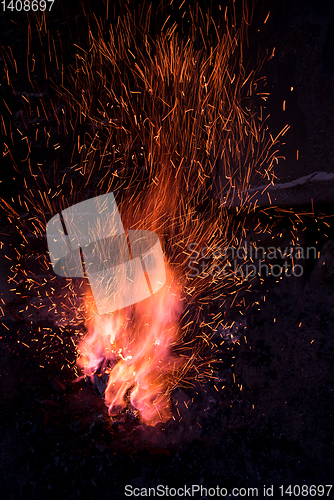 Image of Traditional blacksmith furnace with burning fire