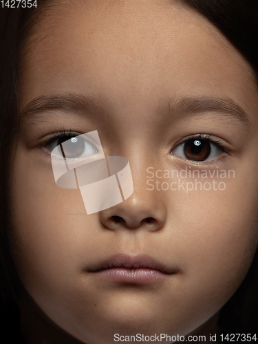 Image of Close up portrait of a little emotional girl