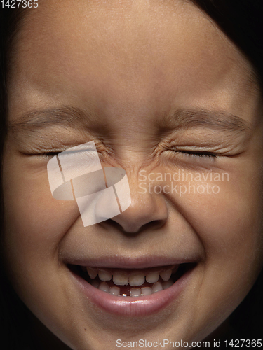 Image of Close up portrait of a little emotional girl