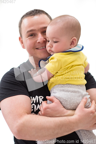 Image of portrait of happy young father holding baby isolated on white