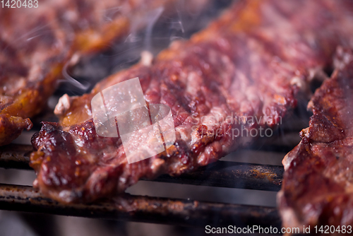 Image of delicious grilled meat on barbecue