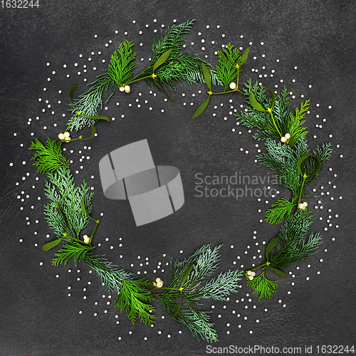 Image of Abstract Wreath with Winter Mistletoe Cedar and Silver Balls