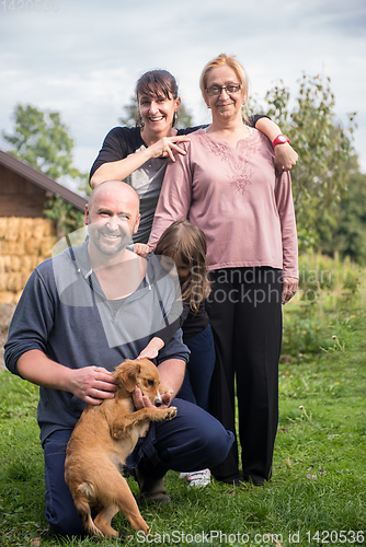 Image of portrait of happy family at farm