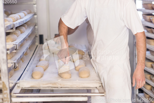 Image of bakers preparing the dough