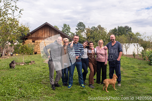 Image of portrait of happy family at farm