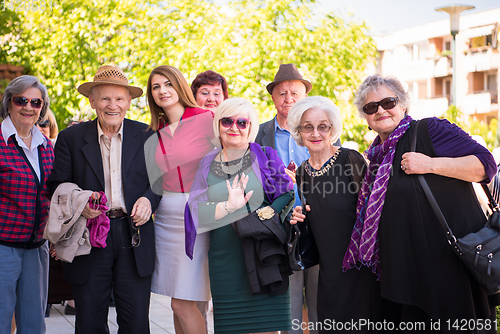 Image of group portrait of senior people with geriatric nurse