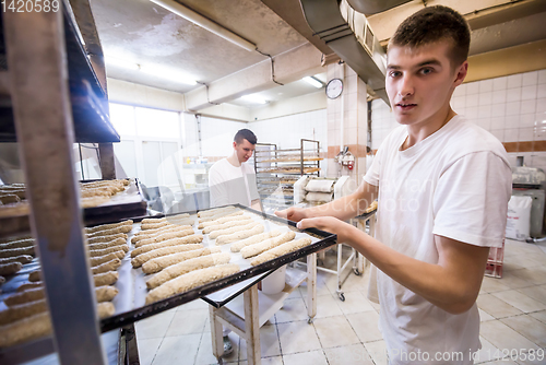 Image of bakers preparing the dough