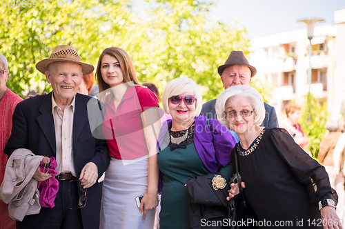 Image of group portrait of senior people with geriatric nurse