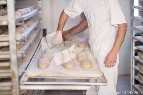 Image of bakers preparing the dough