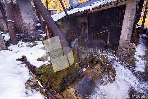 Image of Rural landscape with old watermill in woods
