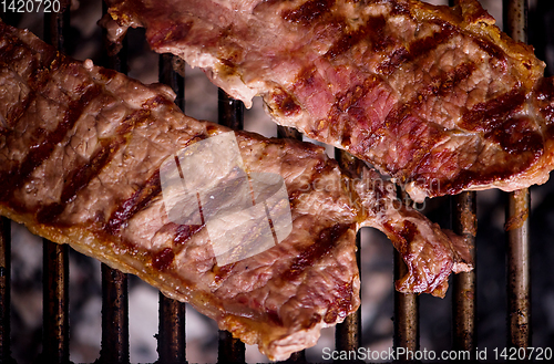 Image of delicious grilled meat on barbecue