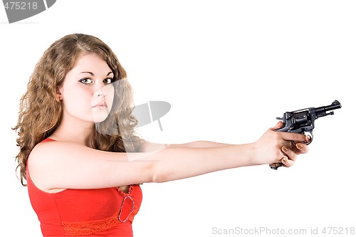 Image of Young woman with a revolver. Isolated on white