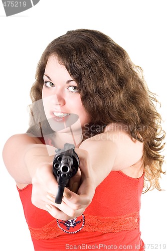 Image of Young woman with a revolver. Isolated on white background