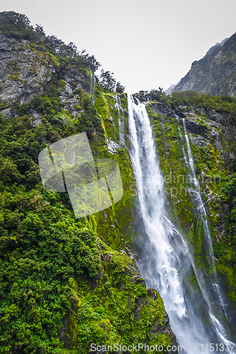 Image of Waterfall in Milford Sound lake, New Zealand