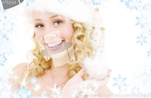 Image of cheerful santa helper girl