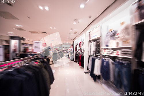 Image of little cute girl in the clothing store