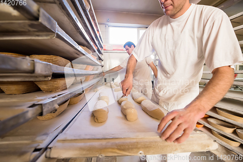 Image of bakers preparing the dough