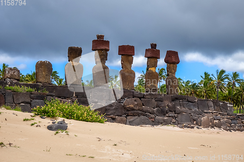 Image of Anakena palm beach and Moais statues site ahu Nao Nao, easter is